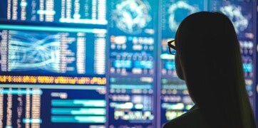 Someone looking at data on a screen